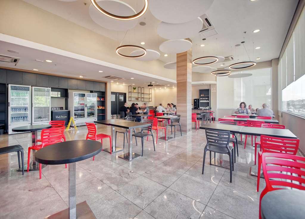 Hus Hotel Dourados Restoran fotoğraf